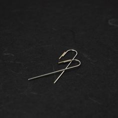 "This pair of minimalistic Arch threader earrings is shaped from a 0,9mm sterling silver wire and then soldered to a 1mm 18kt solid gold wire of 1cm and then brushed for a matte finish. Also available in a traditional shiny finish. They are perfect to complete any casual outfit, also the best gift for design lovers. This listing is for one pair of earrings. ------ HIGH QUALITY We create long lasting, timeless design jewelry handcrafted in Paris with loving attention to details. All AgJc jewelry Minimalist White Gold Earrings With Ear Wire, Minimalist Sterling Silver Yellow Gold Threader Earrings, Minimalist Yellow Gold Sterling Silver Threader Earrings, Minimalist Yellow Gold Linear Earrings In Sterling Silver, Minimalist White Gold Linear Earrings With Ear Wire, Minimalist Hammered Sterling Silver Linear Earrings, Minimalist Linear Earrings With French Hook, Minimalist Hoop Earrings With French Hook, Silver Minimalist Threader Earrings With Ear Wire