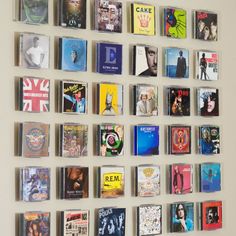 there are many cds hanging on the wall