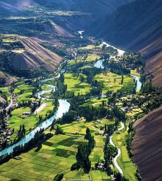 an aerial view of a valley and river