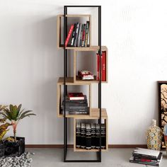 a bookshelf in the corner of a room next to a potted plant