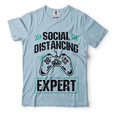 "Gaming T-Shirt Gift For Gamer Funny Gaming Social Distancing T-Shirt This ULTRA COTTON UNISEX T-shirt is made of Pre-shrunk 100% cotton, 6.1-ounce. * Seamless double-needle 7/8\" collar, Double-needle sleeves and hem, Taped neck and shoulders Our T Shirts and Hoodies are Printed by advanced technology Digital Printer on 100% Ultra Cotton tees and hoodies . We use waterbased textile ink, Safest ink type for everyone. Each T shirt is Made individually and double checked for quality before sending Gamer Style Cotton T-shirt With Logo Print, Pre-shrunk Cotton Gamer T-shirt, Gamer Style Cotton T-shirt With Letter Print, Gamer Style Cotton T-shirt With Screen Print, Gamer Cotton T-shirt Pre-shrunk, White Cotton Gamer T-shirt, Gamer Cotton T-shirt With Logo Print, Gamer Funny, Gift For Gamer