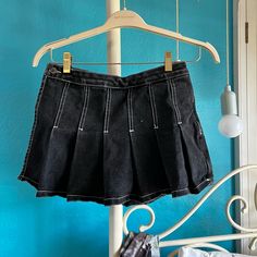 Like New Never Worn Brandy Melville Pleated Skirt/Shorts. Size Small And 100% Cotton. Black With White Stitches I Have Lots Of Other Brandy Melville Listed So Go Check It Out, I Bundle! Y2k Mini Cotton Skort, Trendy Pleated Mini Shorts, Trendy Pleated Mini Length Shorts, Edgy Cotton Mini Skirt, Edgy Summer Skort With Pockets, Edgy Skort With Pockets For Summer, Summer Cotton Mini Hem Shorts, Trendy Black Mini Tennis Skirt, Black Mini Tennis Skirt For Spring