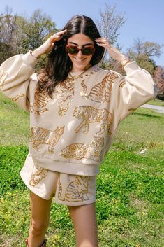 Beige & Gold All Over Tiger Short – Queen of Sparkles Queen Of Sparkles, Blue Graduation, Sequined Sweatshirt, Gold Shorts, Plaid Pajamas, Vintage Couture, Football Tees, Vintage Havana, Clothing Logo