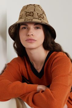 Gucci's bucket hat is jacquard-woven with a blown-up version of the iconic 'GG' monogram. It's made from durable cotton-blend canvas trimmed with textured-leather and has a wide, sloping brim. It'll look so cool worn with tonal shades. Designer Gloves, Gucci Bucket Hat, Gloves For Women, Designer Hats, Luxury Women Fashion, Gucci Leather, Gucci Accessories, Top Designer Brands, Bucket Hats