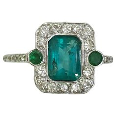 18 karat white gold ring with an emerald of 1.8 carats and diamonds of 0.5 carats / Made in Italy 1960s Ring size US 6.75 Diamond And Emerald Ring, White Gold Ring, Emerald Ring, White Gold Rings, Cocktail Rings, White Gold Diamonds, Gold Ring, Gold Diamond, Gold Rings