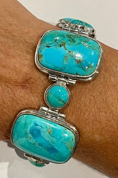 Sterling silver heavy and wide turquoise bracelet bezel set with rectangle and round alternating turquoise stones in a beautiful blue green color with toggle clasp and 3 large jump rings to adjust the length.  1.25 inches in width on the largest stone.  High polish finish with a rhodium finish so it won't oxidize weighing 63.39 grams. Elephant Ring, Blue Green Color, Lucky Elephant, Valley View, Wedding Jewelry Bracelets, Turquoise Stones, Creative Jewelry, Dream Jewelry, Toggle Clasp