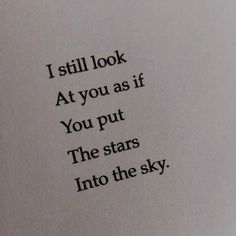 an open book with the words i still look at you as if you put the stars into the sky