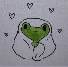 a drawing of a frog wrapped in a blanket with hearts around it's eyes