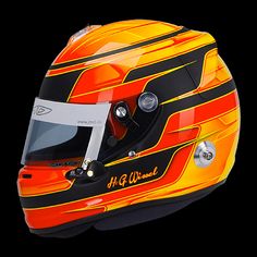 the helmet is orange and black with yellow stripes on it's sides, while the visor has been painted red