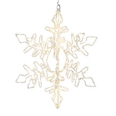 a white snowflake ornament hanging from a string