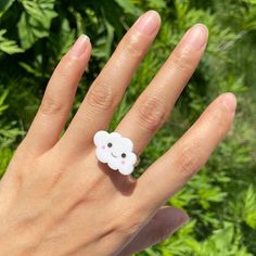 Get lost in the clouds with this adorable Cloud Ring. This ring features a fluffy white cloud with a kawaii face on it. This ring is perfect for anyone who loves cute and unique accessories. It's sure to brighten up your day and make you feel like you're walking on clouds! Trendy White Jewelry With Cute Design, Cute White Rings For Gifts, Cloud Face, Lost In The Clouds, Kawaii Cloud, Cloud Ring, Kawaii Faces, On Clouds, Unique Accessories