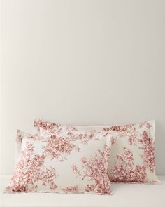 two pillow cases with pink flowers on them