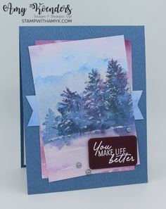 a handmade card with watercolor trees on it and a rubber stamp that says you make life better