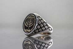 Sterling silver signet ring with ancient Menorah on top The Menorah is made of Brass, and the ring is Sterling silver. This ring have a very dominant and fancy look. All my rings are unique and designed and manufactured by me in my studio, so you can be sure that this ring is one of a kind. The default finish will be mirror polish but you can order the ring in a satin mat finish or rustic black like the last photo. Total time for making the ring is 3 days and another 5-7 days with the express de Antique Sterling Silver Signet Ring For Ceremonial Occasions, Handmade Sterling Silver Signet Ring For Ceremonial Occasions, Handmade Sterling Silver Signet Ring For Ceremonial Use, Ceremonial Sterling Silver Hallmarked Signet Ring, Ceremonial Hallmarked Sterling Silver Signet Ring, Classic Sterling Silver Signet Ring For Ceremonial Events, Mens Pinky Ring, Gift Husband, Silver Signet Ring