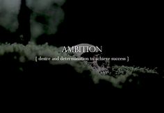 the words ambiton are written in white on a black background with green leaves