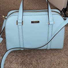 Baby Blue Kate Spade With Tags Still On It! Adjustable/Removable Long Cross Body Strap. Light Blue Office Bag With Detachable Strap, Designer Light Blue Shoulder Bag With Detachable Strap, Elegant Light Blue Top Handle Satchel, Designer Blue Tote Satchel, Designer Light Blue Bag With Detachable Strap, Designer Blue Tote Bag, Designer Light Blue Bags With Detachable Strap, Elegant Light Blue Satchel With Adjustable Strap, Light Blue Formal Crossbody Bag