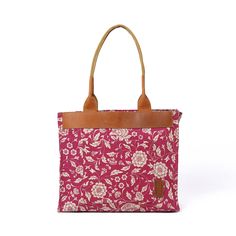 "MARSALA KALAMKARI LARGE TOTE BAG Fabric & leather tote bag: The chic maroon/marsala colour kalamkari print tote bag combined with real tan leather The bag has a zipped pocket, a mobile phone pocket and a small accessories pocket in the inside. Also has a buttoned pocket on the outside The bag has metallic zip closure and cotton canvas handle. Easy to carry and manage. Material : cotton printed lining inside. Size: Height 12\"; width 14\", gusset 4\", handle height 13\" * In stock, ready to ship Cotton Shoulder Bag With Adjustable Strap For Errands, Shopping Tote Shoulder Bag With Canvas Lining, Canvas Tote Satchel For Errands, Cotton Shoulder Bag For Summer Errands, Cotton Bags With Adjustable Strap For Errands, Cotton Bag With Adjustable Strap For Errands, Cotton Summer Bags For Errands, Summer Cotton Bag For Errands, Beige Cotton Shoulder Bag