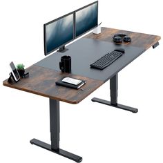 a computer desk with two monitors, keyboard and mouse on it's legs in front of a white background