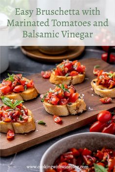 small bruschetta with marinated tomatoes and balsamic vinegar on a cutting board