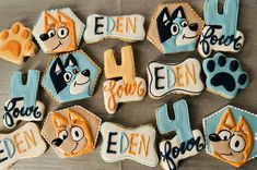 decorated cookies with dogs and cats on them for children's birthday party or baby shower