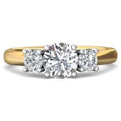 three stone diamond ring in yellow gold