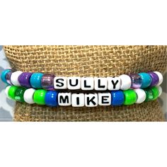 three bracelets with words that say sully, make and multicolored beads