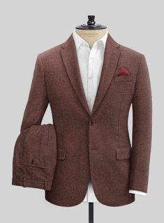 Show up in your finest to every occasion in our Mute Wine Herringbone Tweed Suit. Crafted from wool, this suit is classically styled with a modern appeal to give you a striding confidence everytime you wear it, tweed with its practical, hard wearing qualities, can be dressed up or down, making it a perfect material for a modern man. A white shirt and polished black shoes are all you need to adorn this look. 
 
Look Includes   Mute Wine Herringbone Tweed Fabric  Two Button Jacket Style  Notch Lap Green Tweed Suit, Black Velvet Suit, Light Grey Suits, Tweed Suit, Velvet Suit, Brown Tweed, Herringbone Tweed, Tweed Suits, Gray Suit