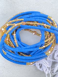 "FREE SHIPPING!! Please Note: Please scroll to see options. **These waist beads ship from Ghana, West Africa. They are traditional and authentic yet fancy and fashionable.* **I will send you nice selection of Waist beads unless you want to make your own choices, then you can email me to send you individual pictures of the waist beads. #Waist beads sizes vary from 35\"-45\" #They are all made with cotton threads #Bead sizes vary from 6/0, 8/0 12/0, 14/0" Traditional Blue Faceted Beads, Bohemian Blue Waist Beads With Spacer Beads, Bohemian Blue Handmade Waist Beads, Handmade Blue Bohemian Waist Beads, Handmade Bohemian Blue Waist Beads, Blue Beaded Bracelets With Gold Beads For Festival, Traditional Blue Beaded Necklace With Gold Beads, Beads Waist, Individual Pictures