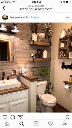 the bathroom is decorated in rustic style with wood accents and shelving above the toilet