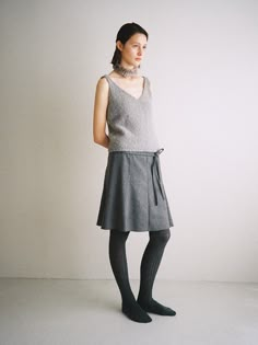 Editor's NotesWoven from cozy wool fabric, this relaxed fit skirt features delicate flare silhouette in midi length. It is accentuated with detachable ribbon strap belt. - Soft and drapery silhouette- Eight-paneled pattern design- Mid or low rise - A-line silhouette - Bemberg-blend lining for added flexibilityMeasurements(in.)Size (S/M)- Waist: 14.37 in / 15.16 in - Hip: 18.50 in / 19.29 in - Length: 21.06 in / 21.46 in * Model info: Height 5' 8 Bust 31 Waist 24 Hip 36, wearing Size S Composition & Care- 100% Wool / Lining: 52% Polyester, 48% Bemberg - Dry Cleaning  Designer- by FADEIIN Grey Pleated Skirt, Fit Skirt, French Chic, Mode Inspo, Wool Skirts, Gray Skirt, Fitted Skirt, Wool Fabric, Fast Fashion