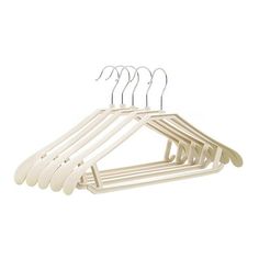 a white hanger with five pairs of clothes hanging from it's hooks on a white background