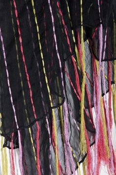 Our one of a kind stylish silk scarf with colorful threading and tassels. Perfect for elevating your favorite evening little black dress. Material: 100% Silk Size : 23" x 71" Black Bohemian Shawl For Spring, Bohemian Black Shawl For Summer, Summer Bohemian Black Shawl, Bohemian Scarves With Tassels For Spring, Multicolor Fringe Shawl For Spring, Black Bohemian Scarf For Summer, Spring Multicolor Fringe Shawl, Spring Multicolor Shawl With Fringe, Black Silk Scarf For Summer