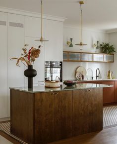 the kitchen is clean and ready to be used as a dining room or office space