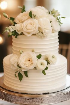 Pure White Simplicity Floral Wedding Cake Cakes With Natural Flowers, Wedding Cake Floral Simple, Non Fondant Wedding Cakes, White Cake With Gold Accents, Textured Wedding Cake With Flowers, Small Wedding Cake Designs, Wedding Cake No Flowers, Minimalist White Cake, Simple Small Wedding Cakes