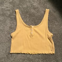 New With Tags *Mustard Yellow Coloring *Cropped Ribbed Tank *3 Buttons All Intact Casual Yellow Ribbed Top, Casual Cropped Yellow Tank Top, Casual Yellow Cropped Crop Top, Casual Yellow Cropped Tops, American Eagle Shirt, Green Flannel, Strapless Crop Top, Eagle Shirts, Orange Blouse