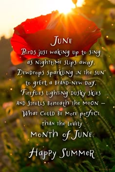 a red flower sitting on top of a lush green field next to the words, june