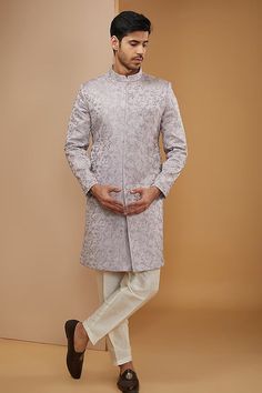 Purple full sleeve achkan with thread, zari embroidery in floral pattern. Paired with off-white mexican pant. - Aza Fashions Long Sleeve Kurta With Naqshi For Reception, Festive Traditional Wear With Naqshi And Long Sleeves, Traditional Wear With Floral Embroidery And Long Sleeves, Formal Long Sleeve Sherwani With Chikankari Embroidery, Festive Traditional Wear With Naqshi, Bollywood Style Traditional Wear With Naqshi, Traditional Fit Long Sleeve Sherwani For Wedding, Long Sleeve Traditional Wear For Winter Wedding, Traditional Long Sleeve Wear For Winter Wedding