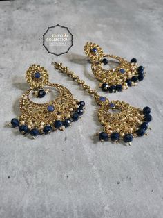 We are thrilled to introduce our exquisite collection of Indian earrings in Navy Blue. These stunning earrings are crafted to enhance your style, whether you're attending a party or a wedding ceremony. They are guaranteed to make you stand out in the crowd.Elevate your style with these stunning Earrings. Make a bold fashion statement and turn heads wherever you go. Shop our stunning collection today!We have a wide range of colors available, so be sure to check our other listings to find the perfect match for your style. In addition to this earring, we have a wide variety of Indian Pakistani jewelry. Explore our shop to discover the perfect piece for your collection. If you're having trouble viewing our photos, try increasing your screen brightness for a clearer image.We aim to dispatch you Blue Latkan Danglers For Wedding, Blue Latkans Danglers For Wedding, Blue Festive Jhumkas Drop Earrings, Blue Jhumkas Drop Earrings For Festive Occasions, Blue Bollywood Jewelry Sets For Gift, Blue Bollywood Style Jewelry Sets For Gift, Blue Kundan Chandbalis For Celebration, Blue Drop Danglers For Festive Occasions, Festive Blue Danglers For Gift