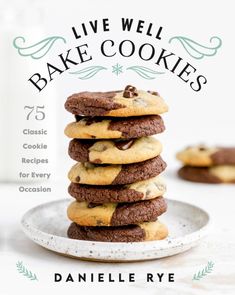 a stack of cookies sitting on top of a white plate