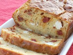 a loaf of bread sitting on top of a white plate