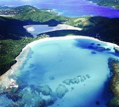 an aerial view of the blue lagoons and white sand beach in st john's, virgin islands