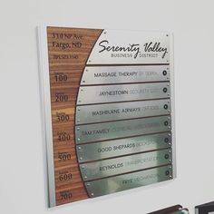 there is a sign on the wall that says serenity valley