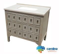 a bathroom vanity with many drawers and a white counter top that has buttons on it