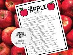 a pile of red apples with the words apple trivia on top and below it