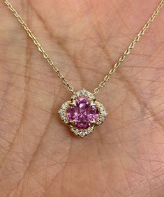 "Beautiful Flower Pendant Rose Gold. Set with Natural pink sapphires and Diamonds. Excellent craftsmanship, all stones set nice and smooth. Good quality pink sapphires, vibrant and full of life. Give her a flower that will last. Great pendant to wear everyday that will go with everything. Lays nicely on the neck, won't flip around. The 14K Rose Gold chain has adjustable loops so you can wear at 18\", 17.25\" or 16.5\" lengths. So pretty! Pendant measures 12.5mm. Genuine Pink Sapphires Gems total Fine Jewelry Pink Flower Shaped Jewelry, Pink Gemstone Flower-shaped Jewelry, Fine Jewelry Pink Multi-stone Necklace, Pink Sapphire Jewelry As A Gift, Pink Sapphire Round Cut Jewelry, Pink Round Cut Sapphire Jewelry, Pink Flower Jewelry With Prong Setting, Pink Sapphire Pendant, Pretty Pendant