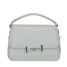 This Is A Used Authentic Tod's Double T Handbag. Crafted From Smooth Leather, This Structured Soft Shoulder Bag Is Detailed With Silver-Tone Double T Embellished Front Flap, Magnetic Button Fastening, Top Handle And Adjustable And Removable Chain And Leather Shoulder Strap, Snap Patch Pocket At Back, Contrasting Inner With One Inner Zip Pocket. It Comes With The Original Shopping Bag, Dust Cover, And All Authentication Cards. This Bag Is In Used Condition. There Is Wear On The Bottom, The Back B Tods Bag, Dust Cover, Small Bag, Smooth Leather, Patch Pocket, Top Handle, Calf Leather, Zip Pockets, Silver Tone