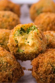 broccoli and cheese balls are on a tray