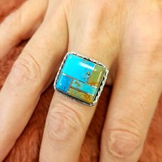 A beautiful handmade square of inlaid turquoise in different shades & matrix set in sterling silver with rope edge detail. Measures just over 3/4" Artist signed EJ Rectangle Turquoise Ring, Elegant Rectangular Turquoise Ring, Square Turquoise Ring, Handmade Silver Turquoise Ring With Rectangular Shape, Mens Square Turquoise Rings, Turquoise Bar Necklace, Turquoise Bar, Silver Turquoise Jewelry, Native American Design