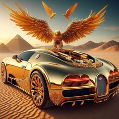 a gold colored car with an eagle on the hood and wings flying over it's head