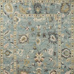 an area rug with blue and beige colors